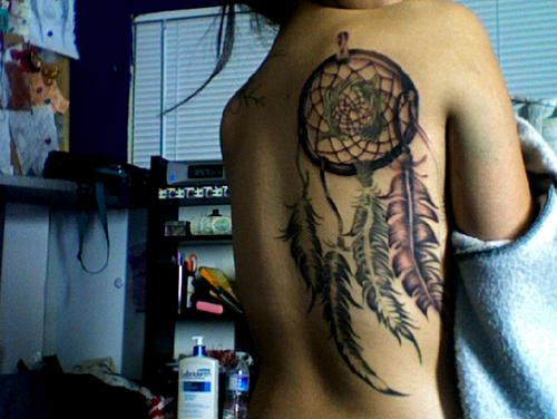 Dreamcatcher tattoo on back