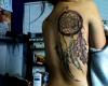 Dreamcatcher tattoo on back