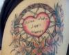 Dreamcatcher and heart tattoos
