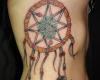 Dreamcatcher tattoo on ribs