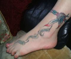 Dreamcatcher tattoo on foot