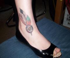 Dreamcatcher on foot tattoo for women