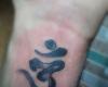 OM symbol tattoo