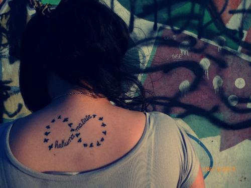 Bird tattoo and quote hakuna matata
