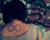 Bird tattoo and quote hakuna matata