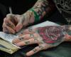 Tattoo rose on hand