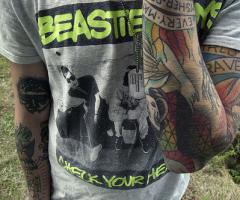 Top tattoo guy on arm