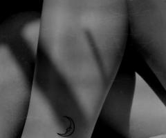 Small moon tattoo