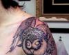 Owl on lines sleeve tattoo