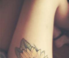 Yellow flower tattoo