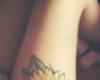 Yellow flower tattoo