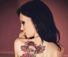 Gothic Skull & Floral Tattoo