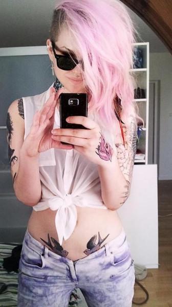 Pink hair tattoo girl