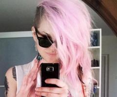 Pink hair tattoo girl