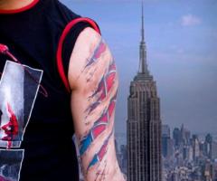 Spiderman arm tattoo