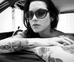 Arm dagger tattoo