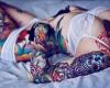 Girl tattoos on arm and ribs