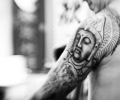 Buda sleeve tattoo
