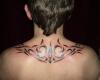http://www.tattooset.com/images/tattoo/2013/01/28/15259-tribal-en-la-espalda-alta_tiny.jpg