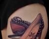 Tatuaje de zapato y rompecabeza