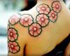 http://www.tattooset.com/images/tattoo/2013/01/30/15341-flores-tatuadas_tiny.jpg