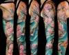 Tatuaje de serpiente en el brazo