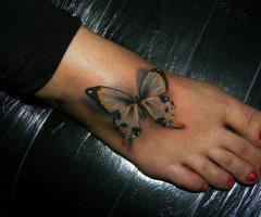 Mariposa en el pie