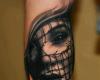Tatuaje realista de la cara de una mujer