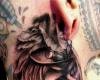 Tatuaje realista de rostro de mujer