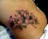 flores tatuajes de mujer