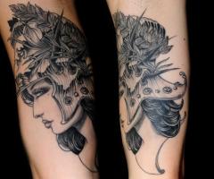 Tatuaje femenino de rostro de mujer