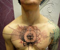 Xoil tattoo eye chest