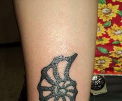 Caracol tribal tattoo mike gonzalez