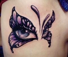 Tatuajes raros con mariposas y ojos