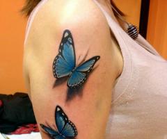 Mariposas tatuaje femenino