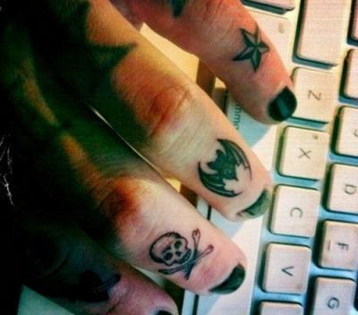 Star bat and skull tattoo