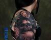 teschi molti tatuato sul braccio