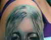 tatouage femme au visage de rose
