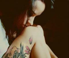 Girl tattoo flower and woman face