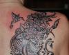 flowers and hummingbirds in the form of tribal