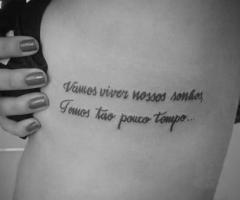 Letters and wuote tattoo