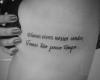 Letters and wuote tattoo