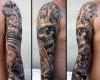 Tatuaje de calavera en el brazo