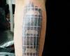 Tatuaje del mango de una guitarra
