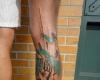 http://www.tattooset.com/images/tattoo/2013/04/20/18092-xoil-needles-side-tattoo_tiny.jpg
