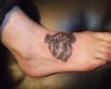 http://www.tattooset.com/images/tattoo/2013/04/23/18124-tatuaje-brasov-craniu_tiny.jpg
