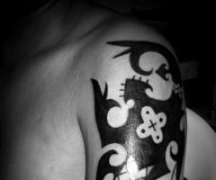 tribal arm tattoo