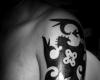 tribal arm tattoo