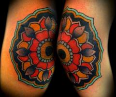 Mandala elbow tattoo