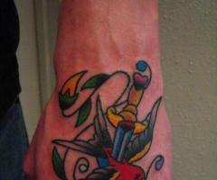 In the hand bird and knife
